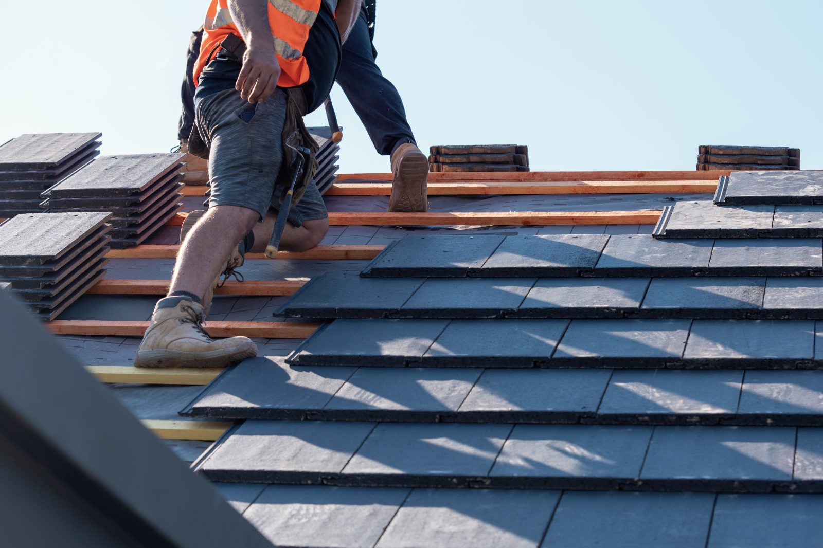 A trusted UK roofer at work on a home renovation project